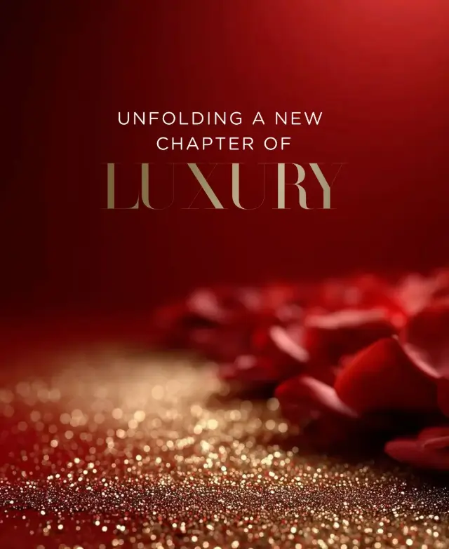 Gold lettering reading Unfolding A New Chapter Of Luxury over deep red rose petals — Homeland Ranjit Avenue Amritsar